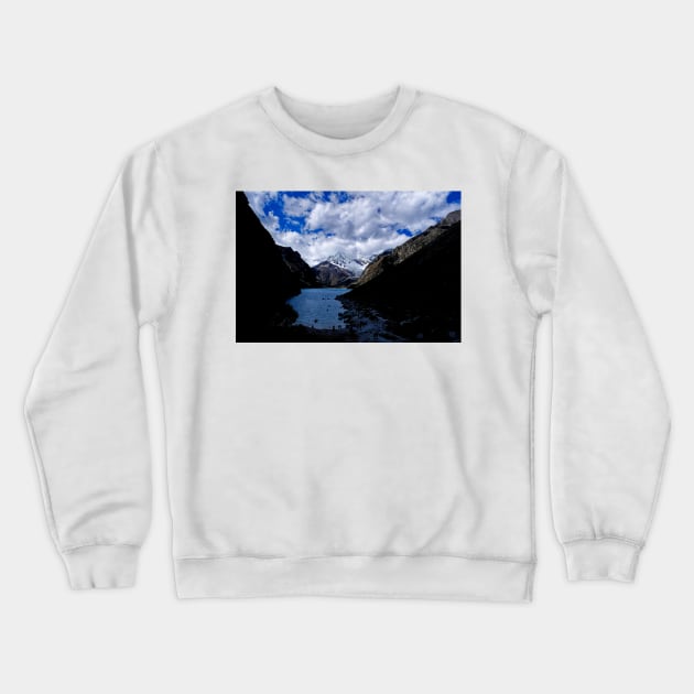 Kayaking in the mountains shadows Crewneck Sweatshirt by stevepaint